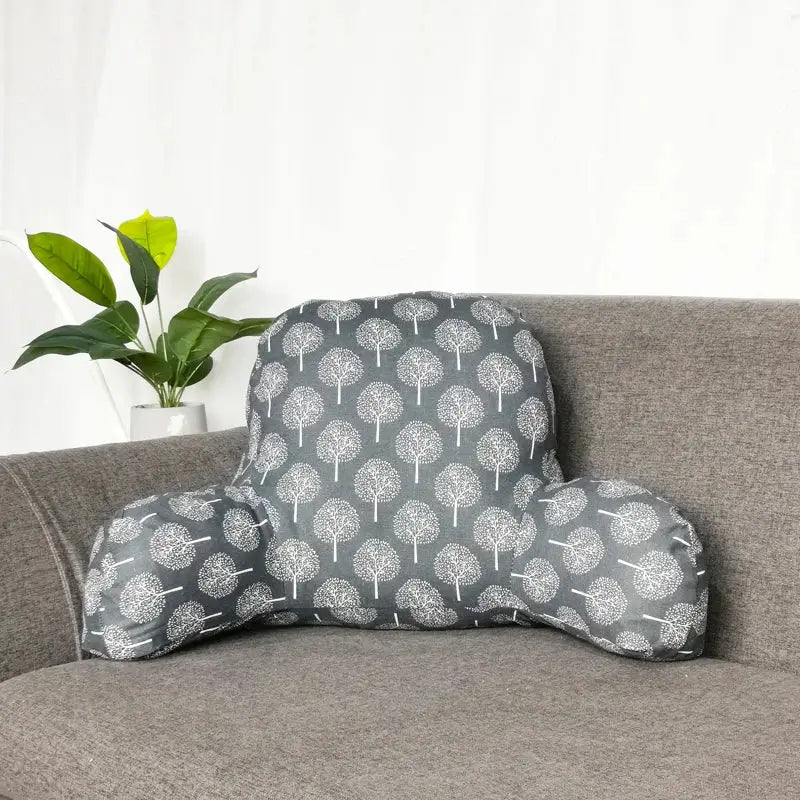 decorative reading pillow with arms