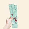 Mint green bookmark featuring a woodland scene with an owl, deer, and rabbit in soft illustration style.