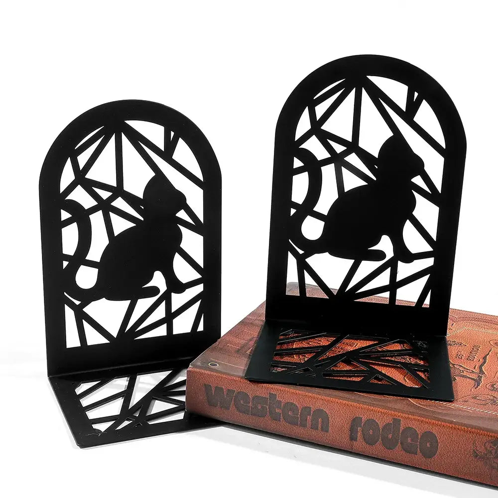 decorative bookends in the shape of cats