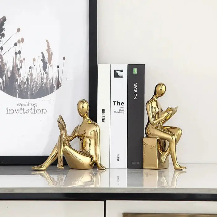 unique ceramic book holder with reader figure