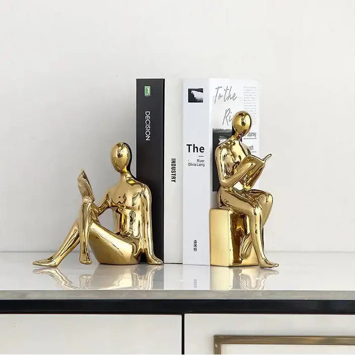 ceramic bookend with a reader figurine