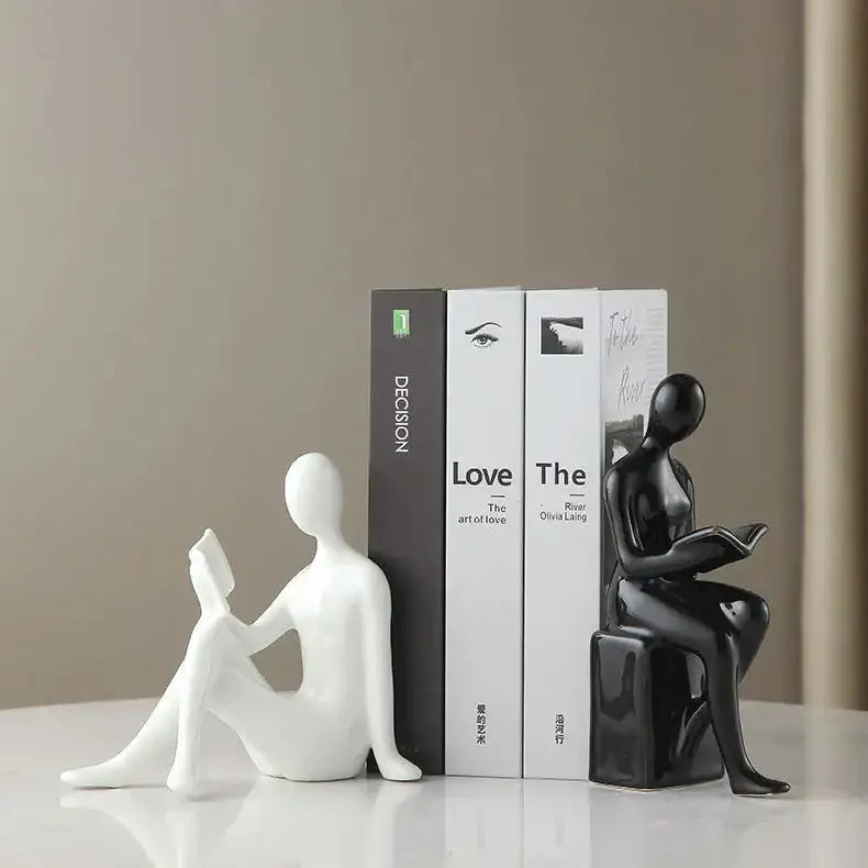 artistic bookend featuring a reader in ceramics