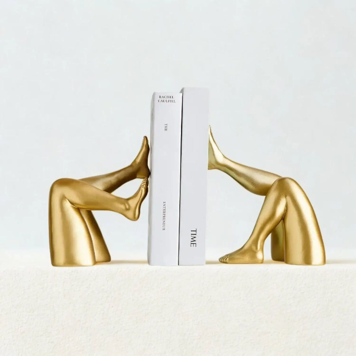 Decorative gold bookend