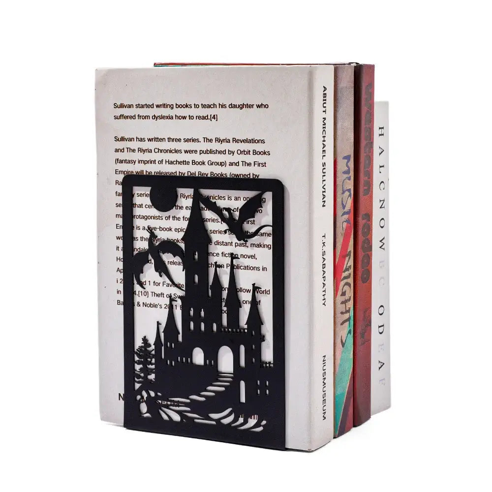 bookend featuring a sculpted dragon made of metal