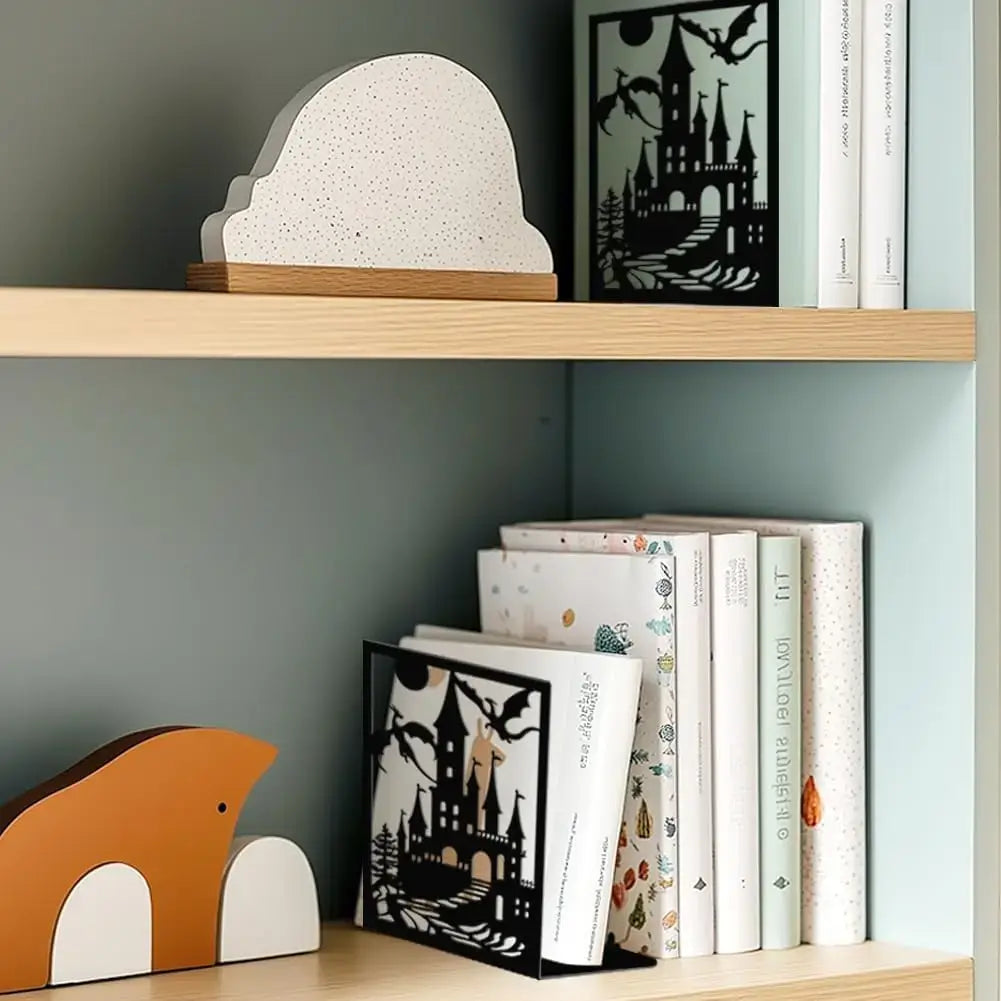 metal bookend in the shape of a fantasy dragon
