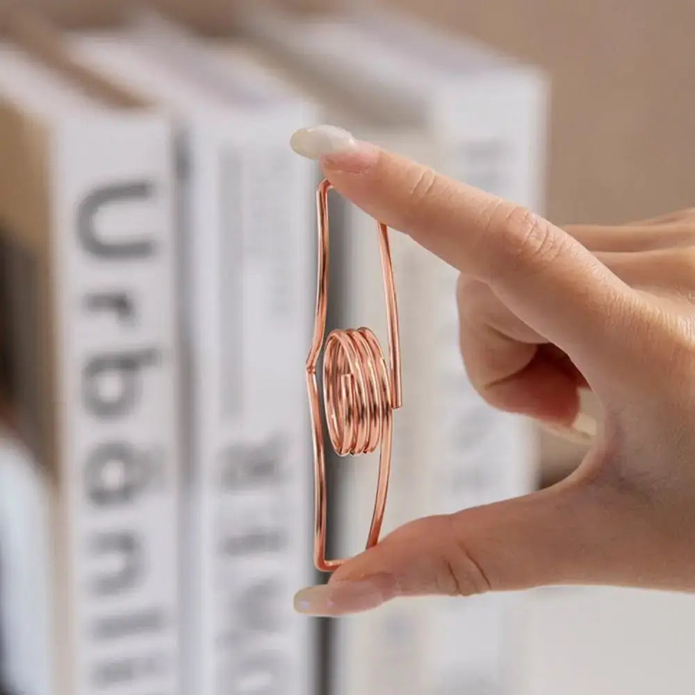 metal page holder for books