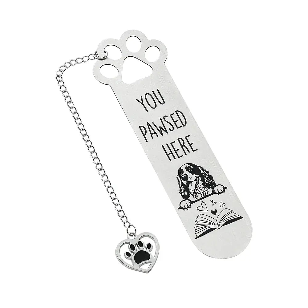metal bookmark featuring intricate engravings