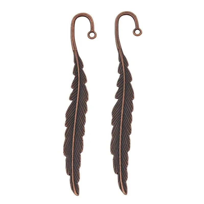 handcrafted metal bookmark in a feather shape