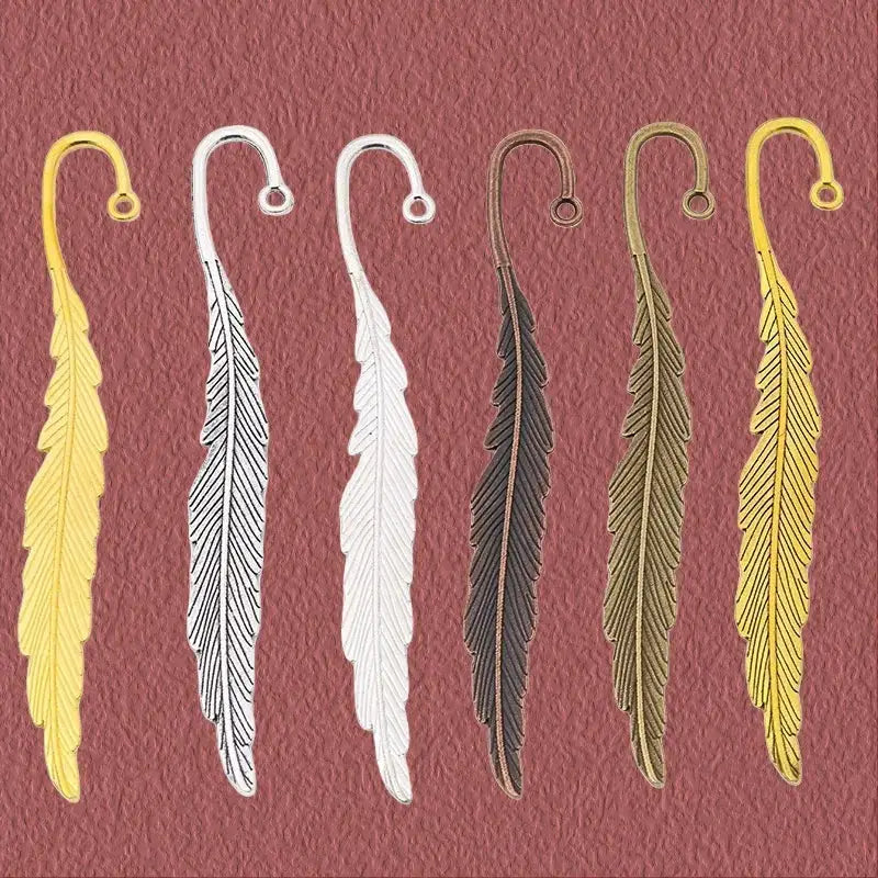 metal feather-shaped page holder