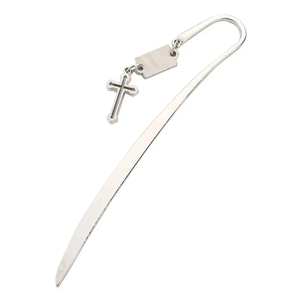 ornate metal bookmark with intricate filigree