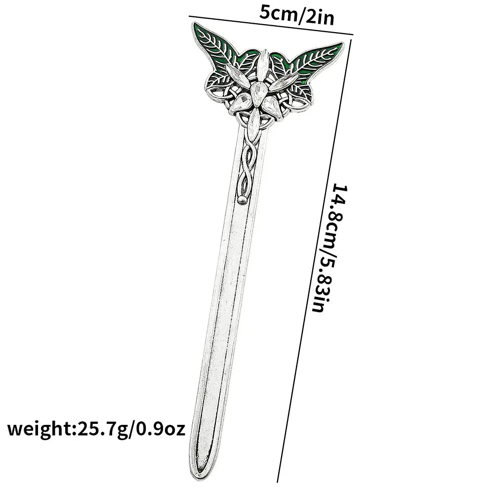 curved metal bookmark resembling a sword