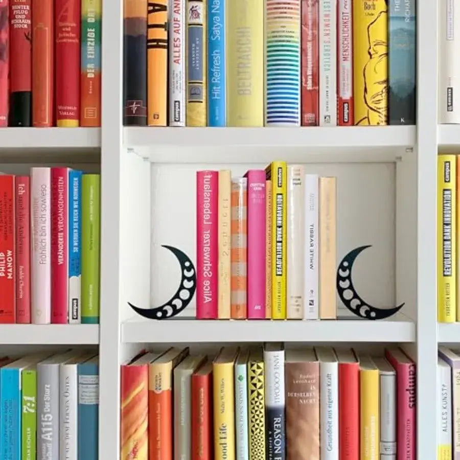 metal bookends shaped like a moon