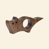 Dark brown wooden cat-shaped ring holder with carved black eyes and a smooth, polished finish.