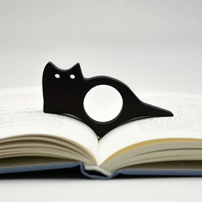 thumb hole reading page holder