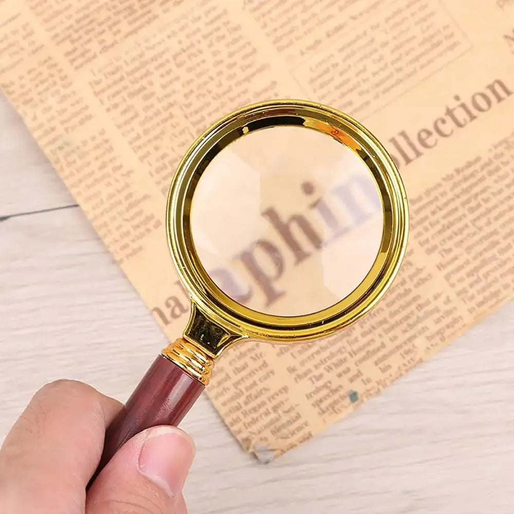 brass magnifying glass with vintage design